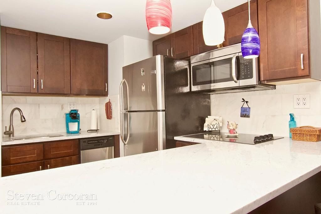 25 Tudor City Place, Unit 1805 — photo 3